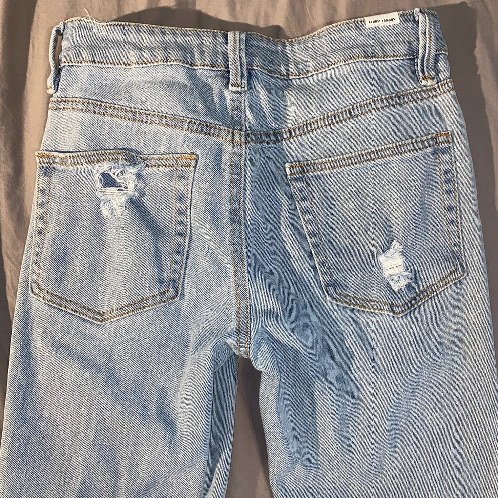 Light-washed Ripped Jeans